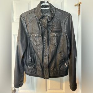 Black faux leather biker jacket. Says XL, fits medium